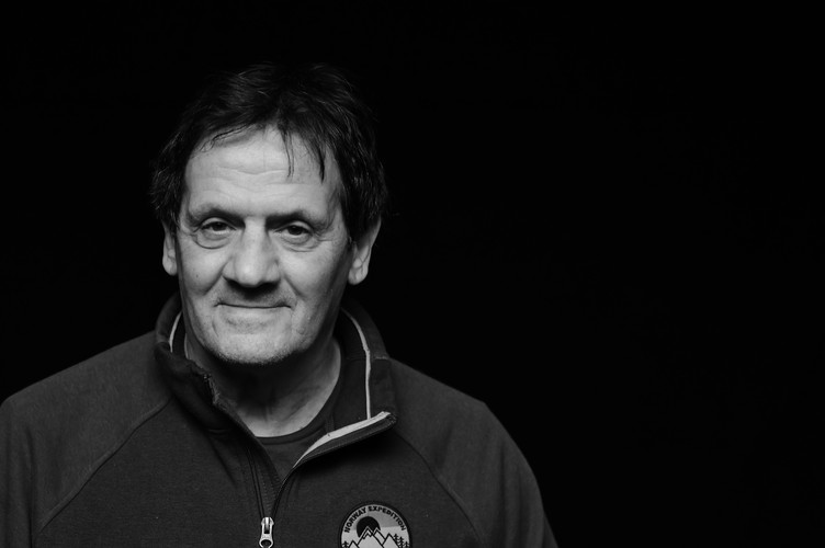 Ritratto in bianco e nero di Mario Delfino.